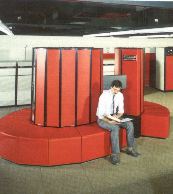 /hpc-intro/Man%20sitting%20on%20Cray%202%20supercomputer,%20credit%20MIT%20Technology%20Review
